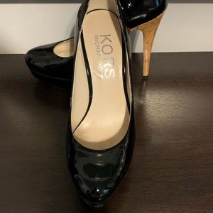 Black patent Michael Kors pumps. Worn once!